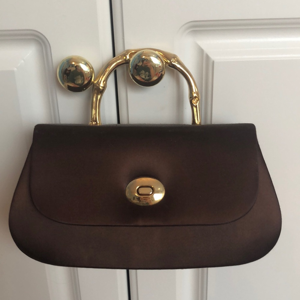 The cutest mini purse with a bamboo style handle